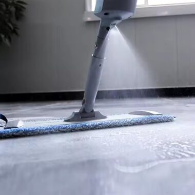 Home cleaning spray mop with 360-degree swivel head and refillable water bottle