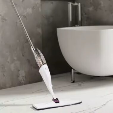 Magic flat spray mop with microfiber pad, ergonomic handle, and 360-degree swivel head