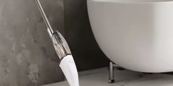 Magic flat spray mop with microfiber pad, ergonomic handle, and 360-degree swivel head