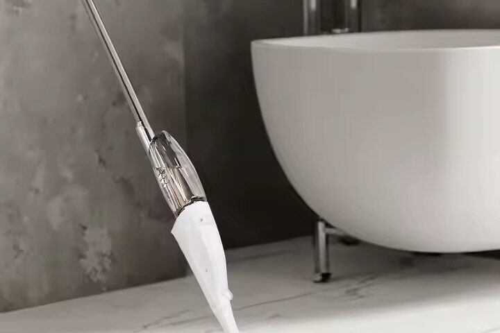 Flat Magic Microfiber Spray Mop for Effortless Home Cleaning (1) Magic flat spray mop with microfiber pad, ergonomic handle, and 360-degree swivel head