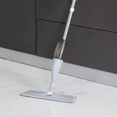 Magic flat spray mop with microfiber pad, ergonomic handle, and 360-degree swivel head