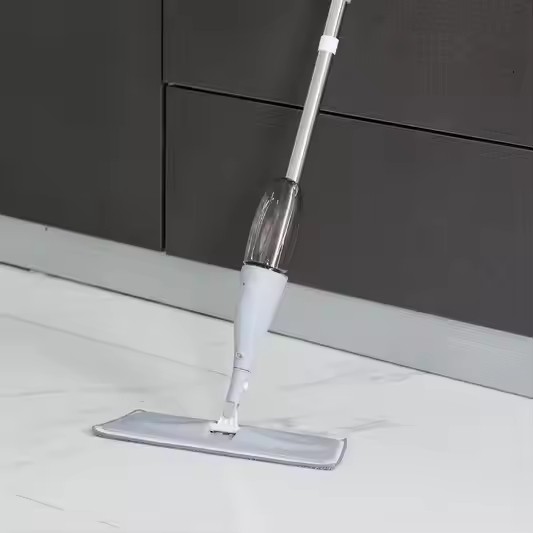 Magic flat spray mop with microfiber pad, ergonomic handle, and 360-degree swivel head