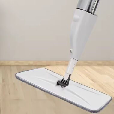 Magic flat spray mop with microfiber pad, ergonomic handle, and 360-degree swivel head