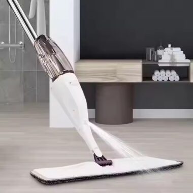 Magic flat spray mop with microfiber pad, ergonomic handle, and 360-degree swivel head