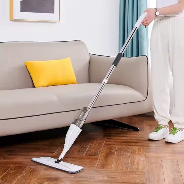 Lightweight portable spray mop with ergonomic handle and microfiber pad for home floor cleaning