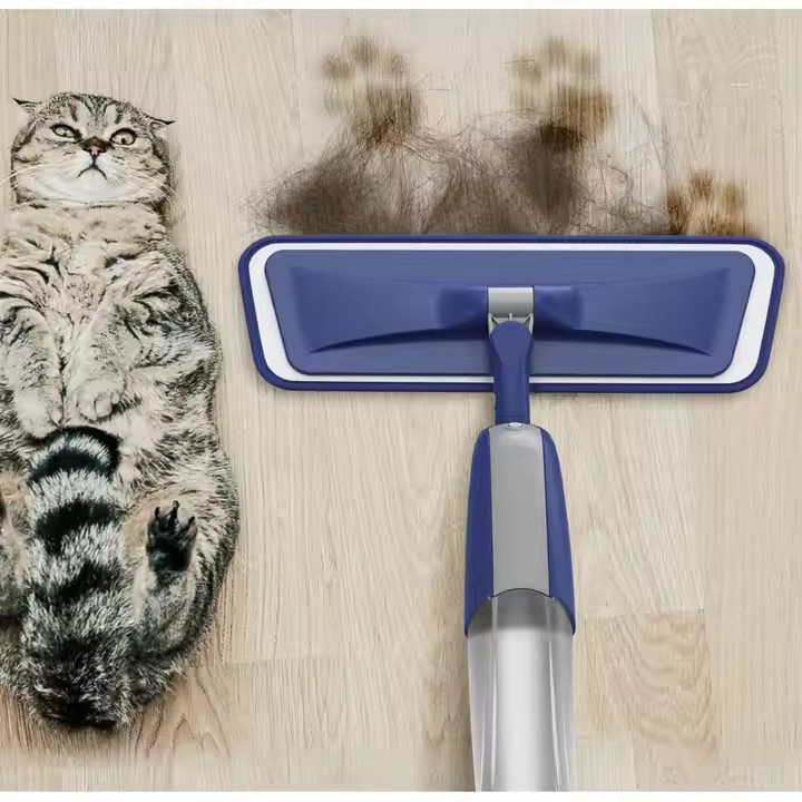 Lightweight portable spray mop with ergonomic handle and microfiber pad for home floor cleaning